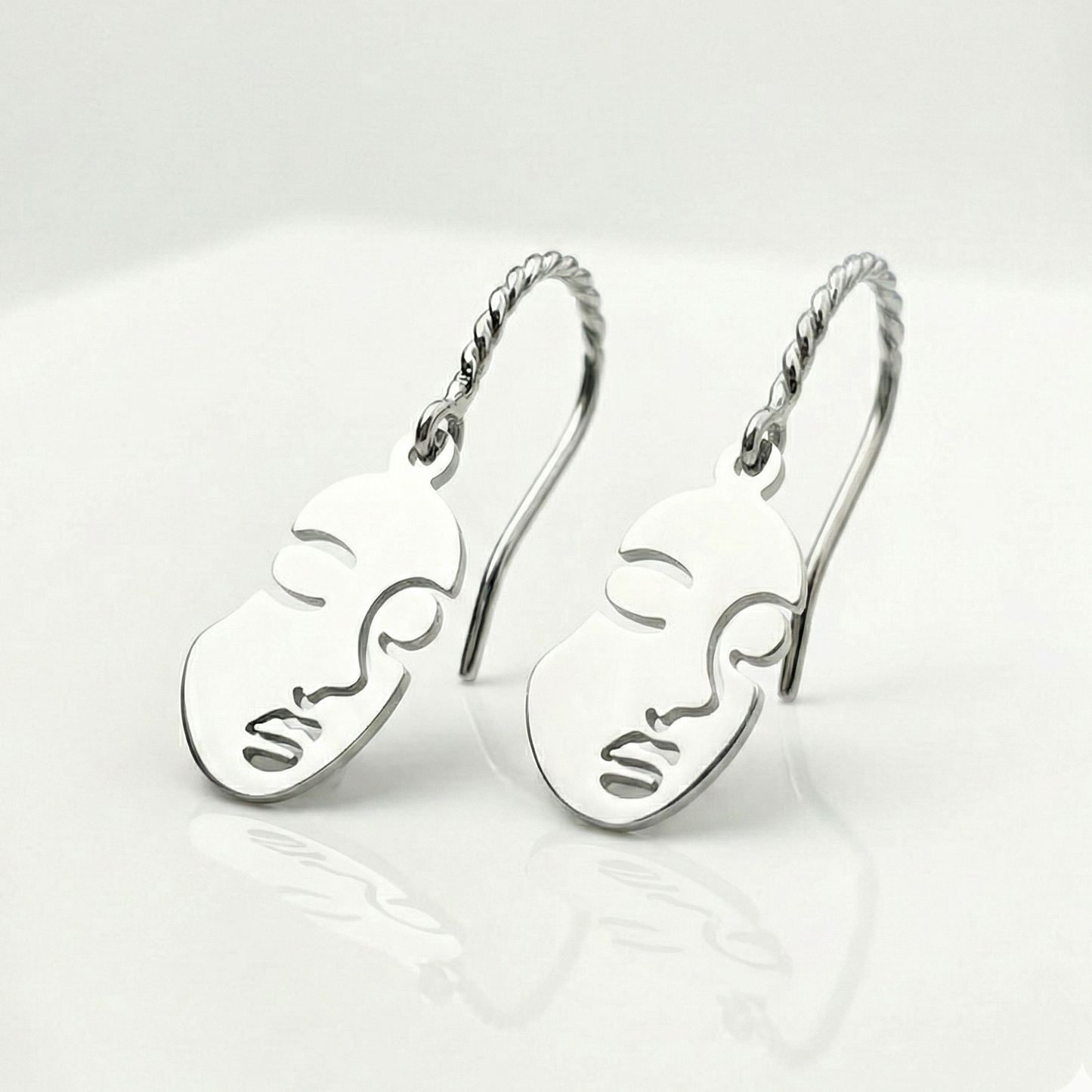 Orecchini Little Faces - Acciaio Inox